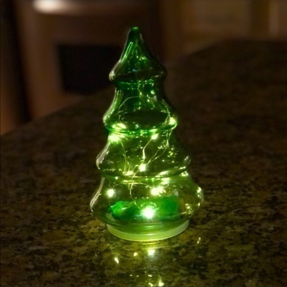 Glass Christmas tree that lights up with fairy lights